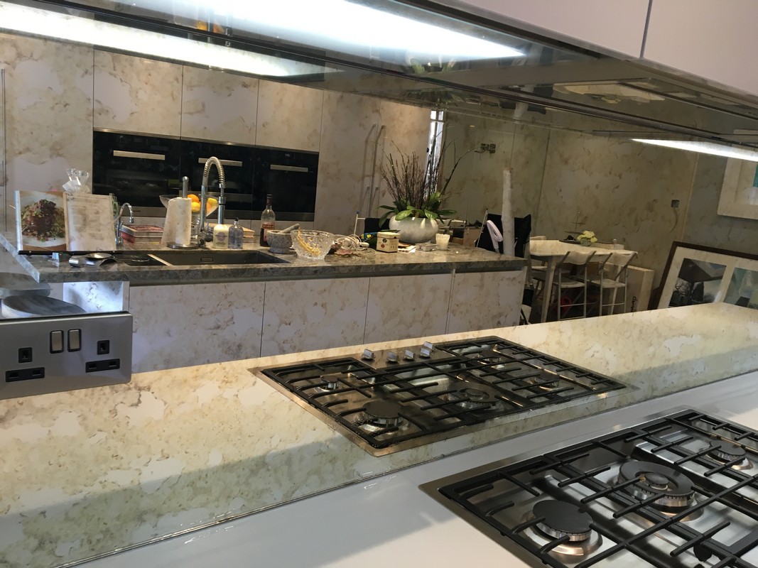Mirror glass splashback in Sutton luxury kitchen